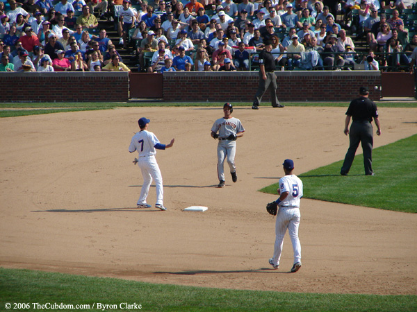 Omar Vizquel, Ryan Theriot, and Ronny Cedeno