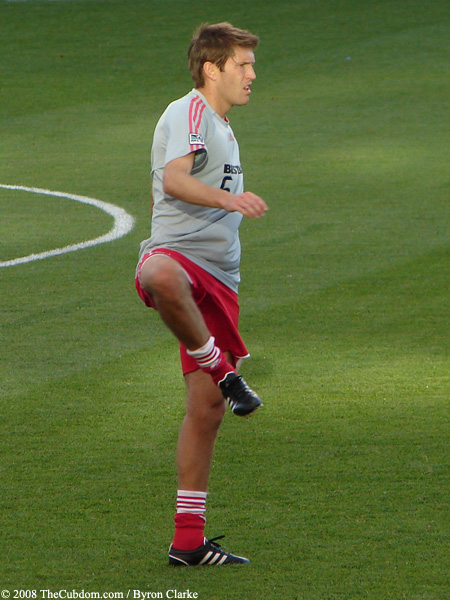 Brandon Prideaux stretches before the match