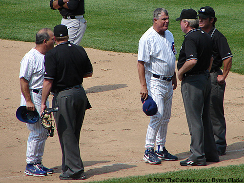 Lou Piniella and Matt Sinatro argue with the umpires