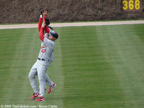 Skip Schumaker and Chris Duncan collide